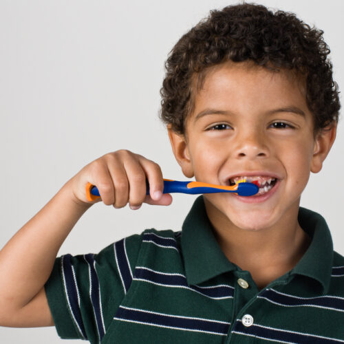 Handsome,Young,Boy,Brushing,Teeth